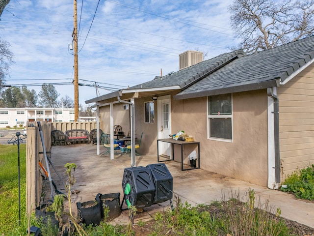 rear view of house with a patio