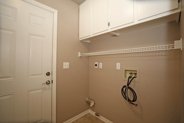 laundry area featuring washer hookup, gas dryer hookup, cabinets, and electric dryer hookup