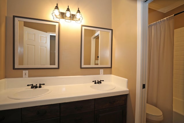 full bathroom featuring vanity, ornamental molding, toilet, and shower / bath combination with curtain