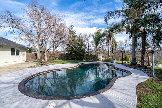 view of swimming pool with a patio, a fenced backyard, and a fenced in pool