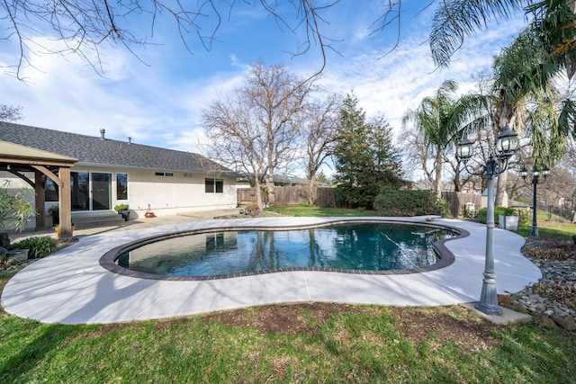 view of swimming pool with a patio area, a fenced backyard, and a fenced in pool