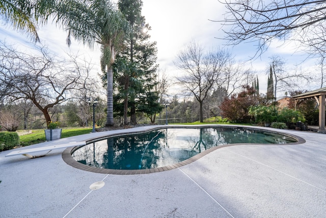 pool featuring a patio