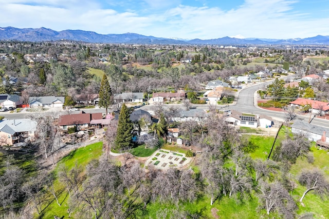 birds eye view of property with a residential view and a mountain view