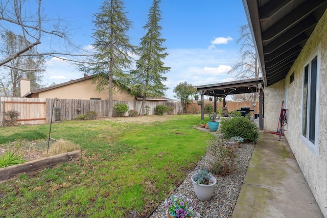 view of yard with a patio area