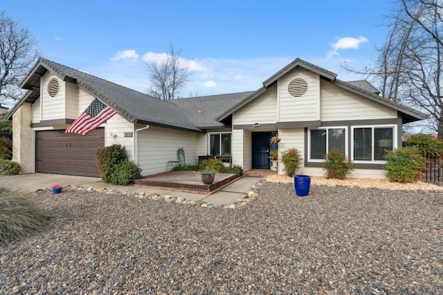 single story home with a garage