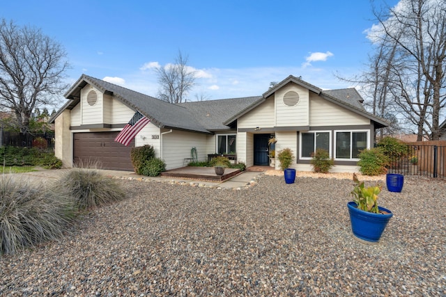 single story home with a garage