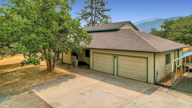 view of front of home featuring a mountain view