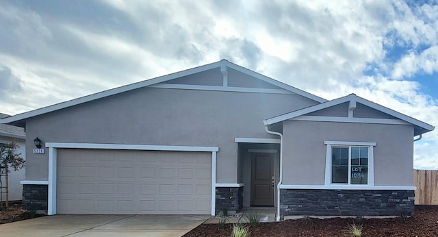 ranch-style house featuring a garage