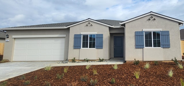 ranch-style house featuring a garage