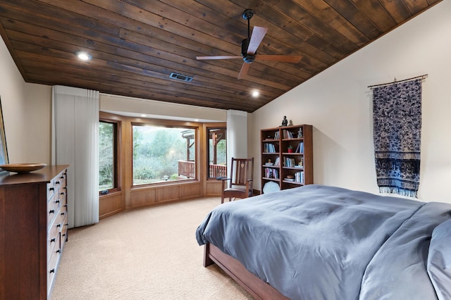 bedroom featuring lofted ceiling, light colored carpet, a ceiling fan, visible vents, and wood ceiling