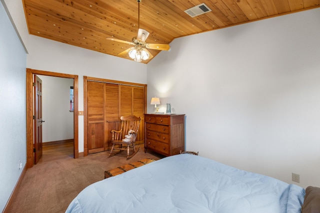 bedroom with baseboards, visible vents, lofted ceiling, wood ceiling, and carpet flooring