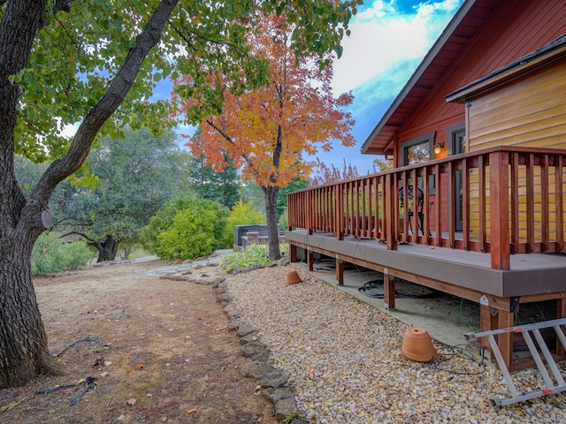 view of yard with a deck