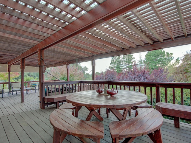 wooden deck with outdoor dining space