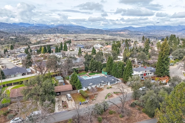 birds eye view of property with a residential view and a mountain view