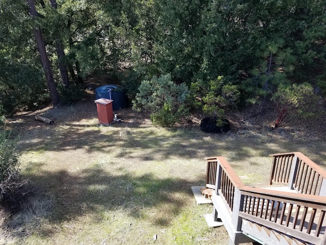 view of yard with a deck