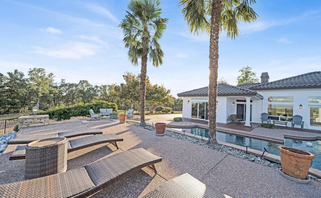 view of pool with a patio area