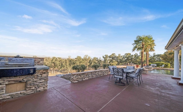 view of patio with area for grilling