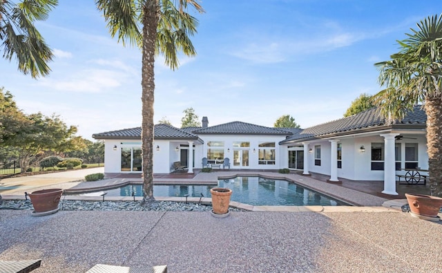 view of swimming pool featuring a patio area