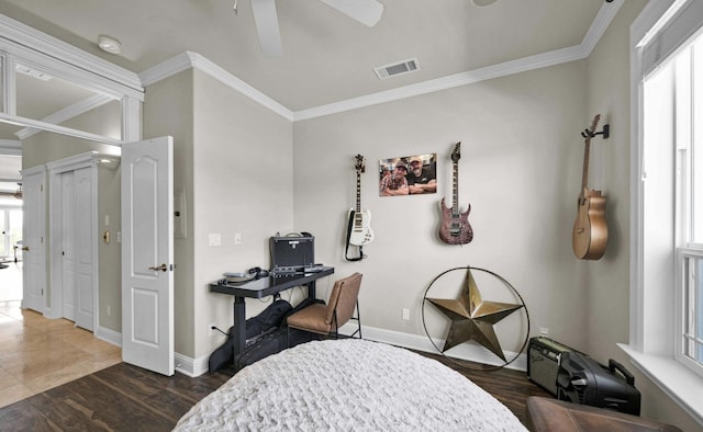 office with ornamental molding, dark hardwood / wood-style floors, and ceiling fan