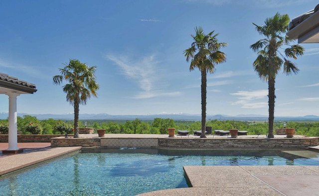 view of pool featuring a mountain view