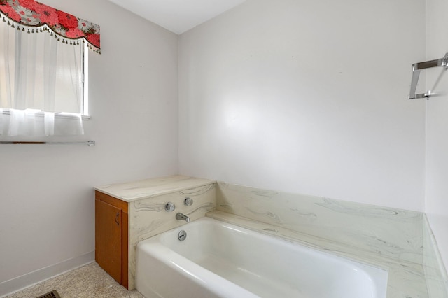 bathroom featuring a washtub