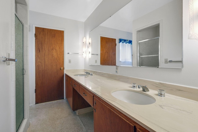 bathroom with vanity and walk in shower