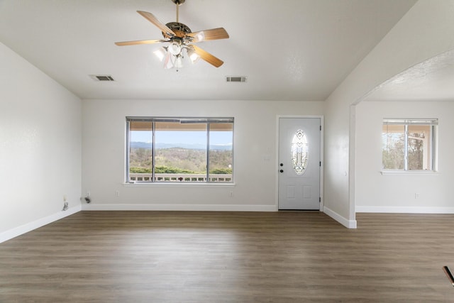 entrance foyer featuring ceiling fan and dark hardwood / wood-style floors