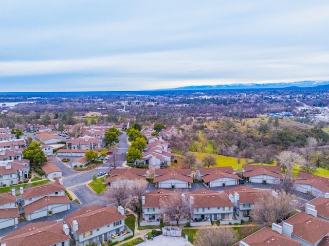 birds eye view of property with a residential view