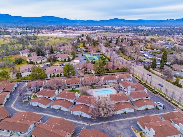 bird's eye view featuring a residential view and a mountain view