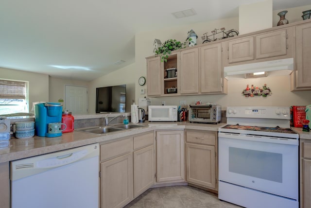 kitchen featuring white appliances, a toaster, light countertops, under cabinet range hood, and a sink