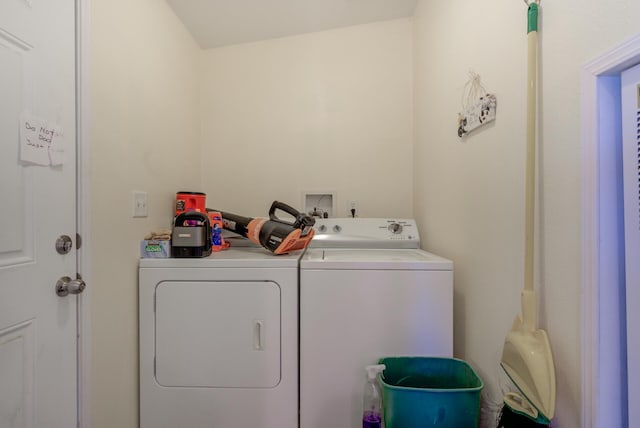 washroom with laundry area and washer and clothes dryer