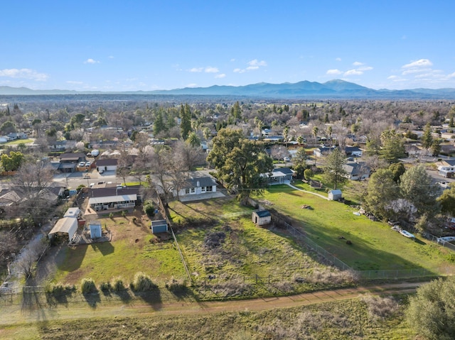 drone / aerial view with a residential view and a mountain view