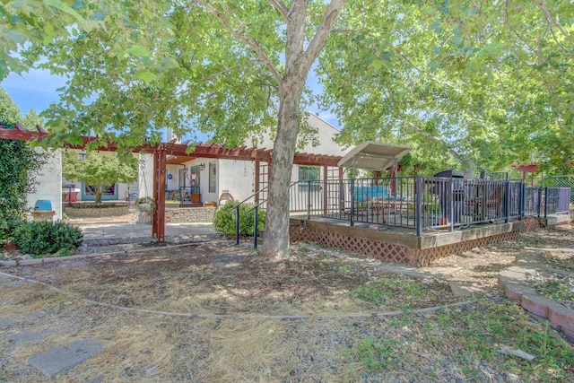 exterior space with a pergola