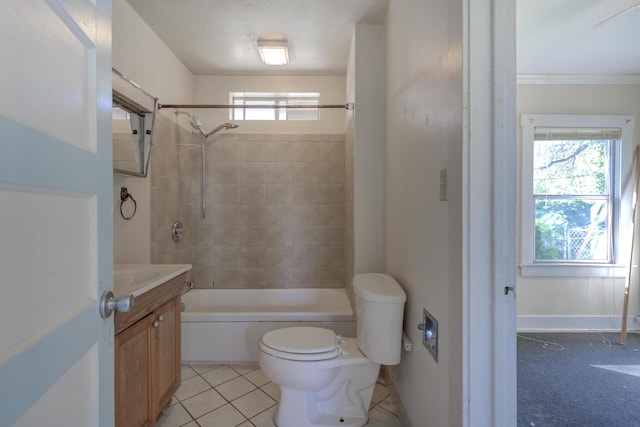 full bath with toilet, bathing tub / shower combination, baseboards, vanity, and tile patterned floors