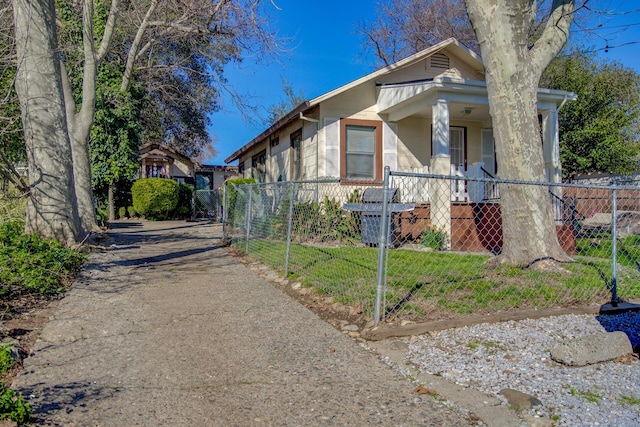 view of side of property with a fenced front yard
