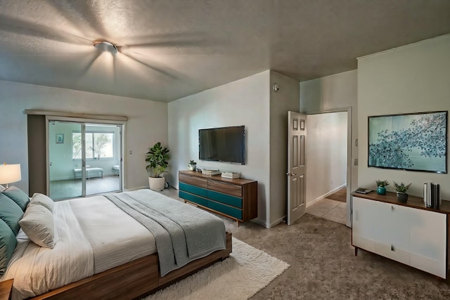 carpeted bedroom featuring a ceiling fan