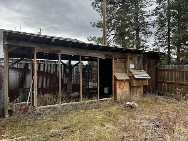 view of outdoor structure with an outdoor structure and fence