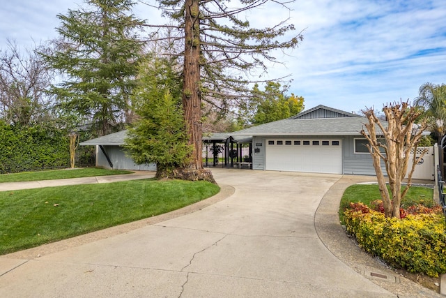 single story home with a garage, concrete driveway, a front lawn, and roof with shingles