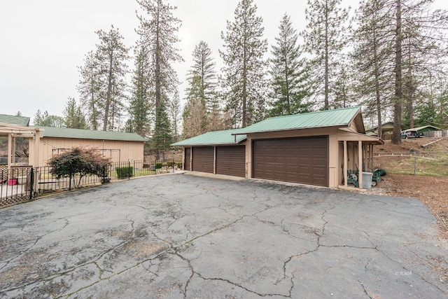 detached garage with fence