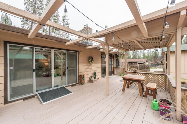 wooden terrace featuring a pergola