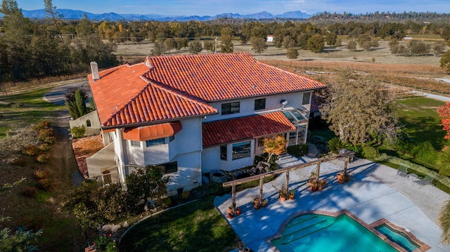 bird's eye view with a mountain view