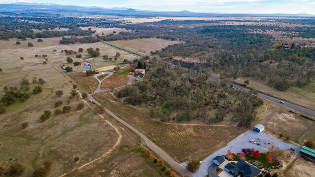 bird's eye view with a rural view and a mountain view