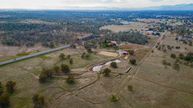 bird's eye view with a rural view and a mountain view