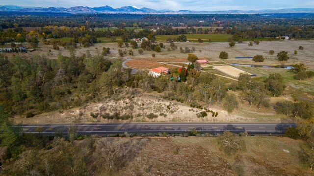 aerial view featuring a rural view and a mountain view