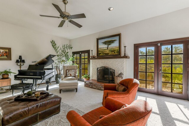 living room with ceiling fan, carpet flooring, french doors, a fireplace, and recessed lighting