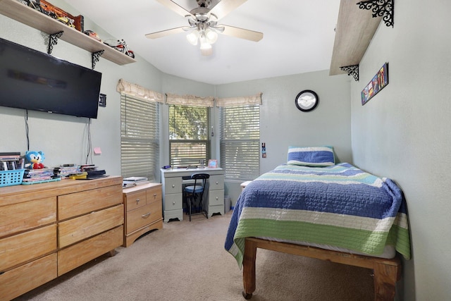 bedroom with light carpet and ceiling fan