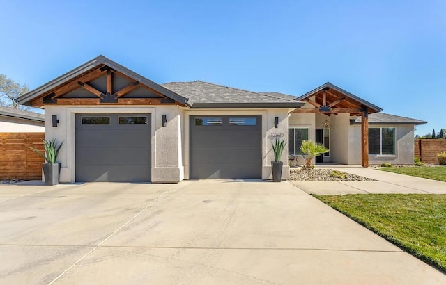 10156 Victoria Dr, Redding, CA 96001 - view of front of house featuring concrete driveway, fence, an attached garage, and stucco siding