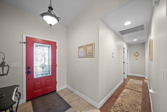 entryway featuring visible vents and baseboards