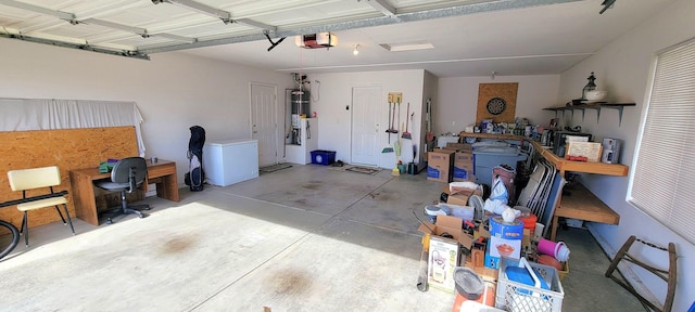 garage featuring a garage door opener, strapped water heater, and fridge