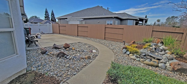 view of yard featuring a fenced backyard and a patio